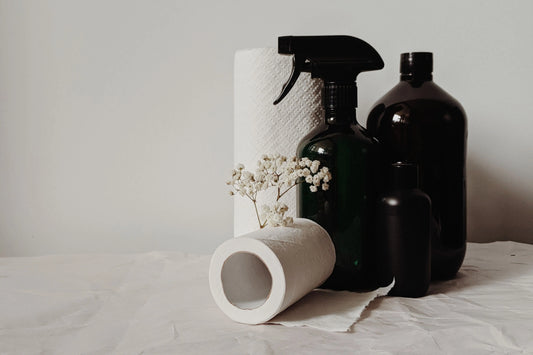 black glass bottles with different closures