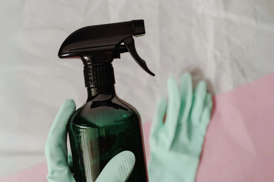 a trigger spray bottle being cleaned