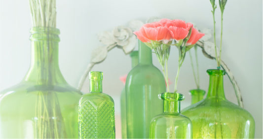 Why are glass bottles Green?