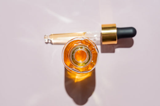 a dropper bottle with essential oil